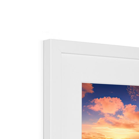 A small photo is displayed on a white picture frame.
