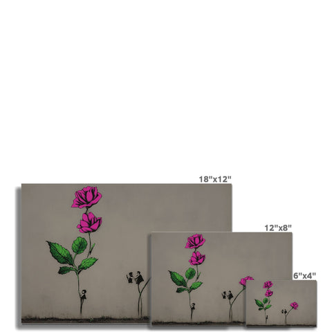 A wall mounted art painting of flowers on concrete and glass with graffiti covered in a green