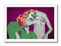 People kissing on top of an art print and a green flower growing in front of a