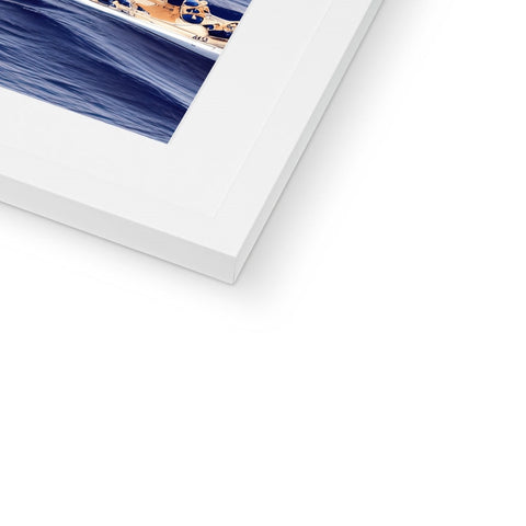 A picture of a picture of the Pacific Ocean on a white photo frame in a book
