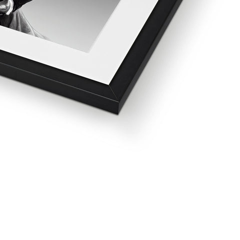 A picture frame with a black background and white image.