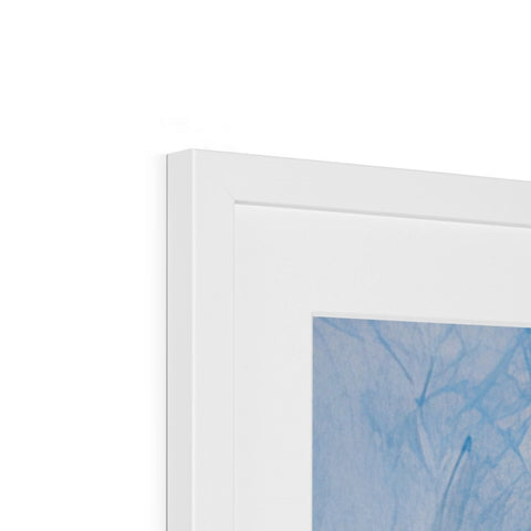 a picture of a white picture frame with colorful background that is in a white paint shop