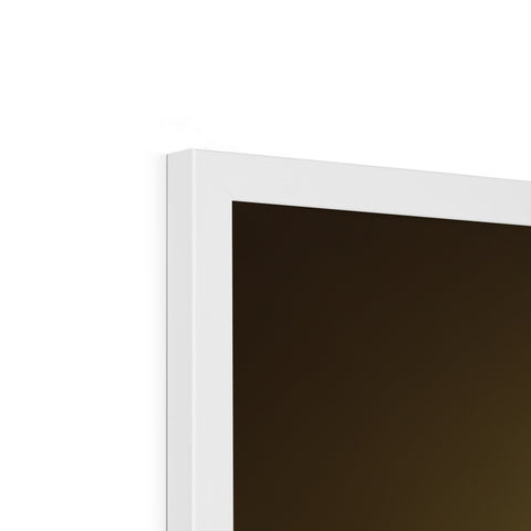 An imac is positioned against a window with its big screen on it.