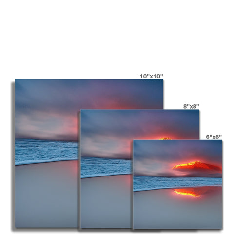 Four image frames sitting next to each other on a tiled wall.