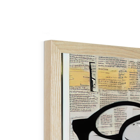 A person looking at a paper with glasses on a wooden frame