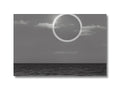 An art print of an eclipse in the sky.