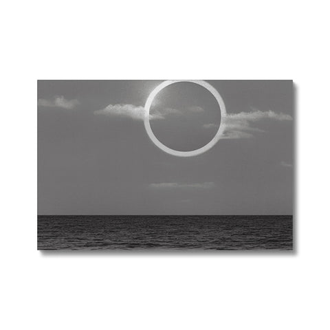 An art print of an eclipse in the sky.