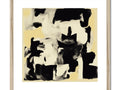 An abstract painting that is framed in gold on a fireplace mantel with a clock on