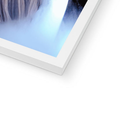 A white image of a cloud covered photo on a computer side view display board with a