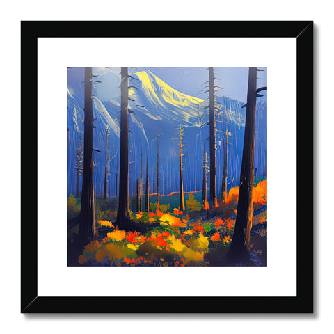 An art print sitting next to a mountain under a dense forest with white brush