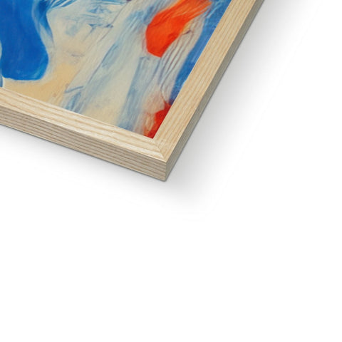 An abstract painting in a wood frame on a book on a countertop of a building