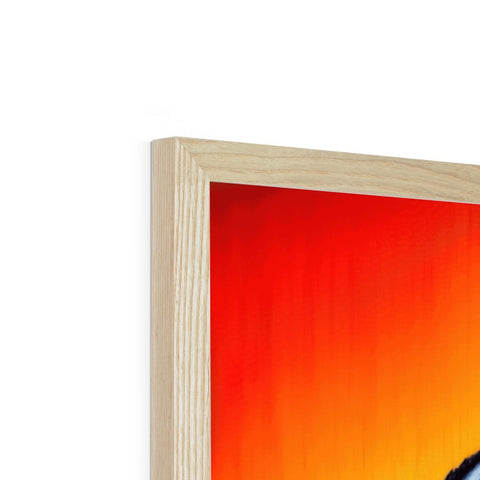 A photo frame of a fire fireplace sitting on a wooden mantel.