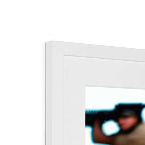 A picture frame that is framed in a mirror on a wall behind a white background.