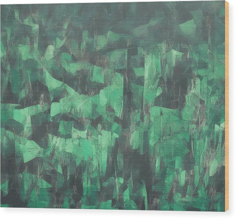 The painting is sitting on the floor of a room that is filled in green and covered