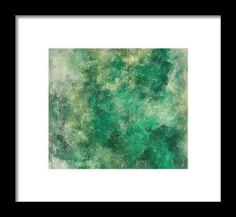 An art print filled with green algae and coral sitting on a beach.