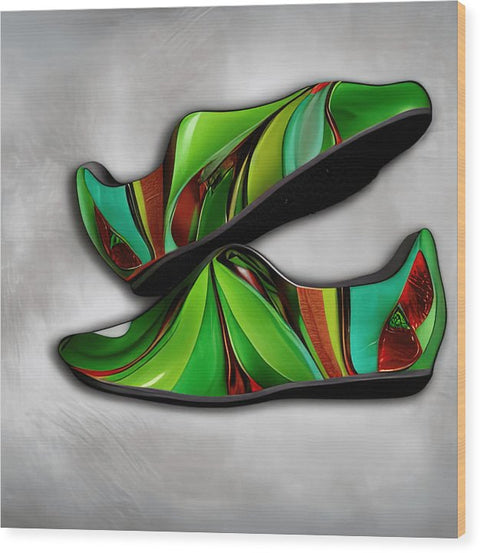 The bottom foot of the green shoe is covered in the ink with an art print.