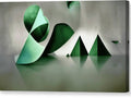 A large outdoor sculpture thats painted with green white and dark green