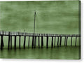 a pier with a boat dock and an art print on it
