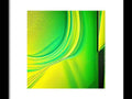 An abstract art image is hanging on the wall with a bright green touch of green