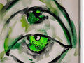 An eye in a bottle is painted with a gun with a green letter