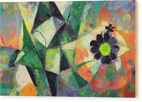 Large green flower is on a flower petal print painting on a canvas.