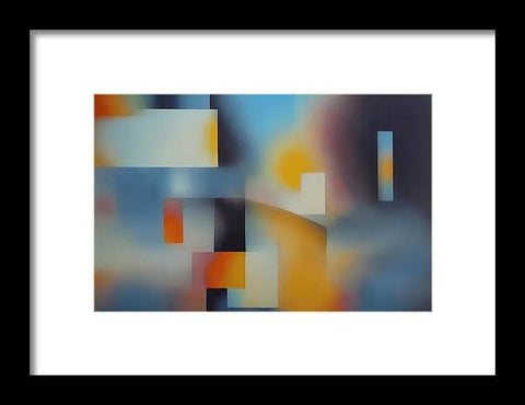 An art print of an image of an abstract painting in an office.