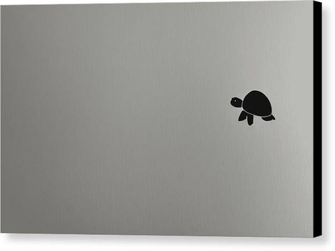 An apple laptop with an origami sticker on the side of it