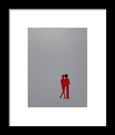 A couple kissing in front of an art print.