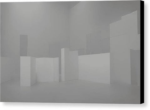 A wall in a white room with an empty space above it has a dark lamp
