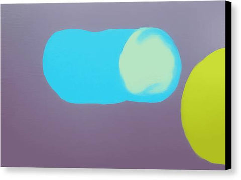 Three colorful spheres hanging from a wall inside of a green painting