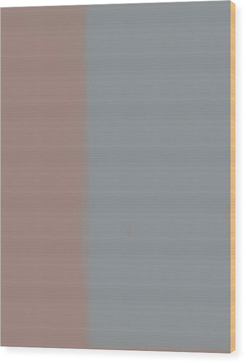 A blank wall is white tile with gray and orange stripes.