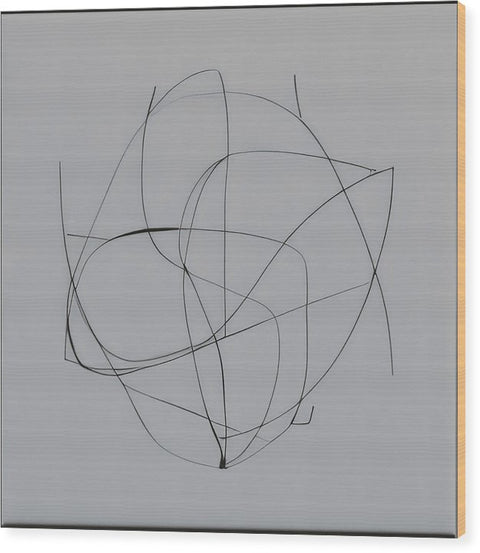 A white photo book has two paintings on the cover with an intersecting line.