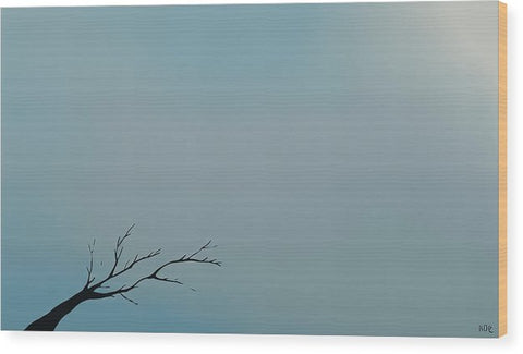 Art print on a blue canvas with trees under display.