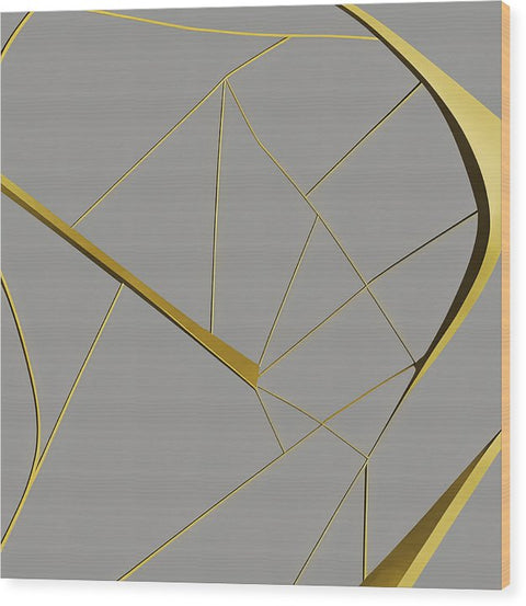 A gold foil sculpture of gold foil with a geometric pattern on it in a room.