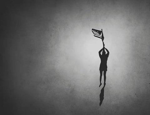 A black and white photo painted on two poles of a flag