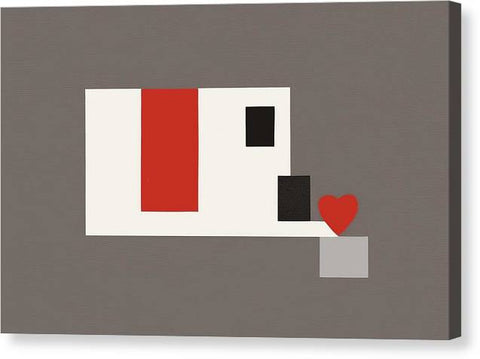 A toaster sticker is placed in a brown card of a black and white heart
