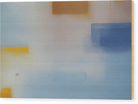 A white painting with an abstract canvas on it shows a blue background.