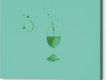 A green wine glass is used to pour something into a white paper and glass