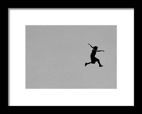 a man on skateboard is running in the air