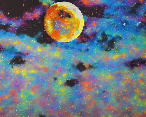 A psychedelic spray painted mural of a moon on a table.