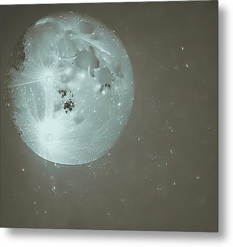 A white art print of a moon with an orb on a white background painted in light