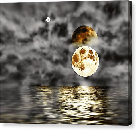 A blanket and mouse pad with a picture of a moon on it