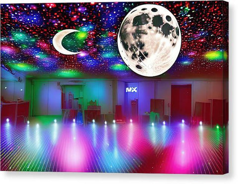 a dance floor with a projection screen and ceiling lights