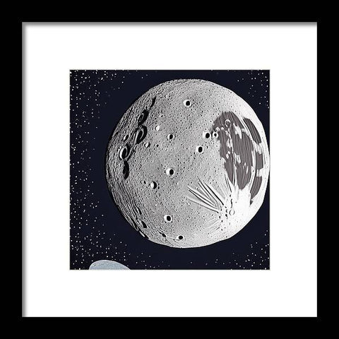 Art print photo of a moon in a crater next to it.