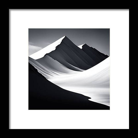 a black and white photo of a mountain range with a snow covered peak