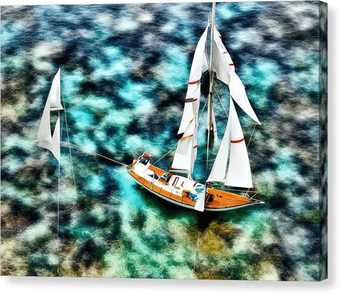 A sailboat and a print blanket on the water