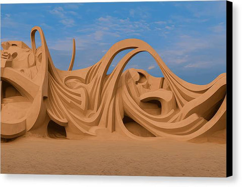 a sand sculpture carved with intricate designs on it holding wind surfing boards at the beach