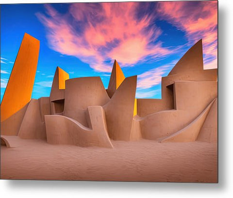 An adobe building in the desert with a sky that is topped with sand dunes