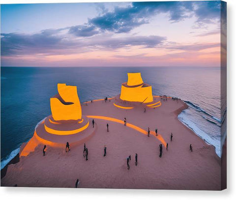 A large piece of artwork sitting in a sand castle under a sunset