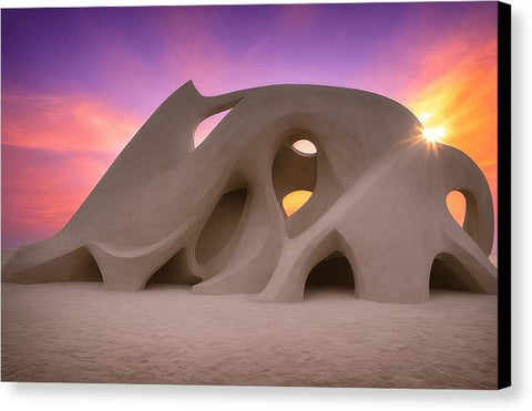 An outdoor structure that is in the middle of a desert sand field